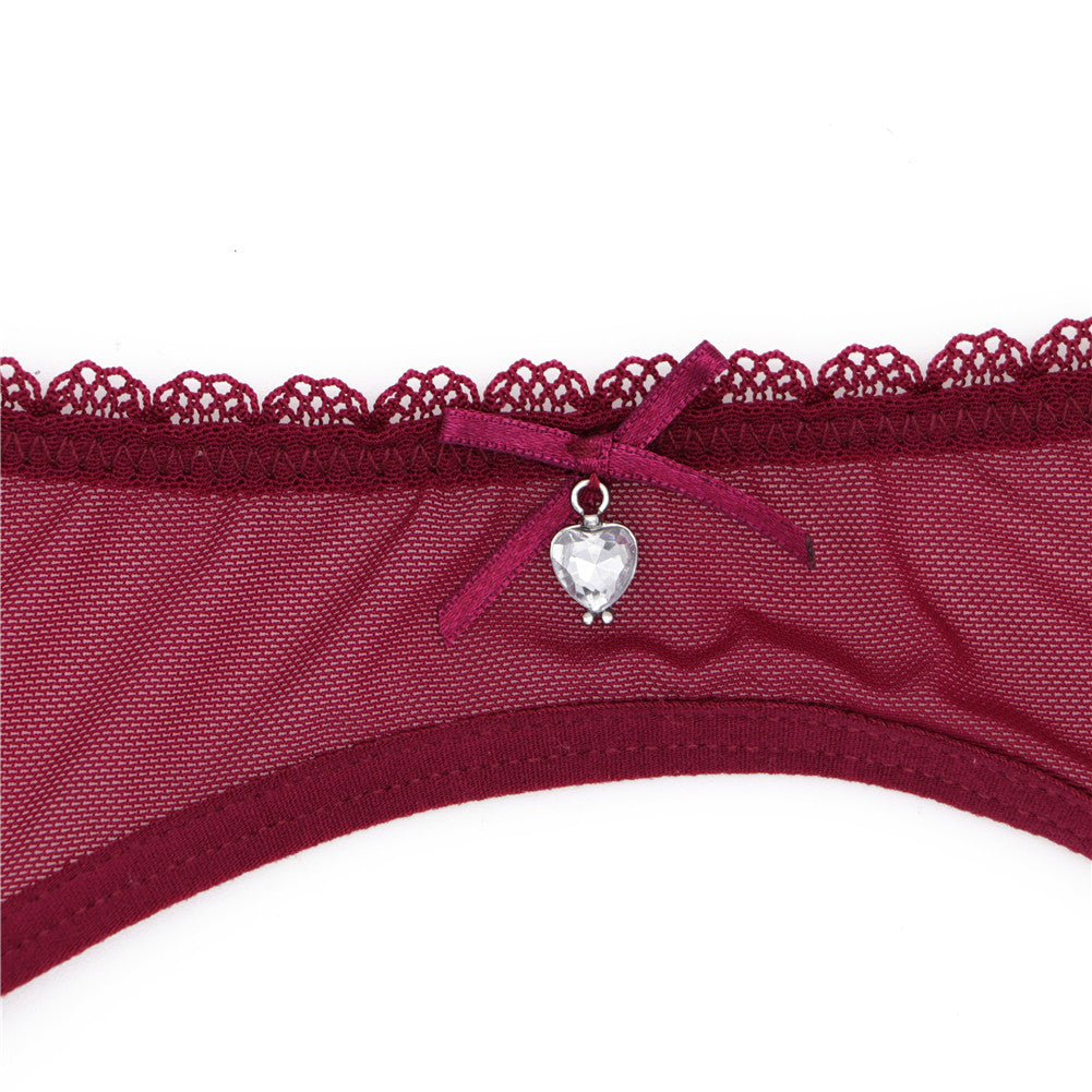 Ultra-thin transparent yarn lingerie set with bras, garters, thongs, and stockings by The Clothing Company Sydney.
