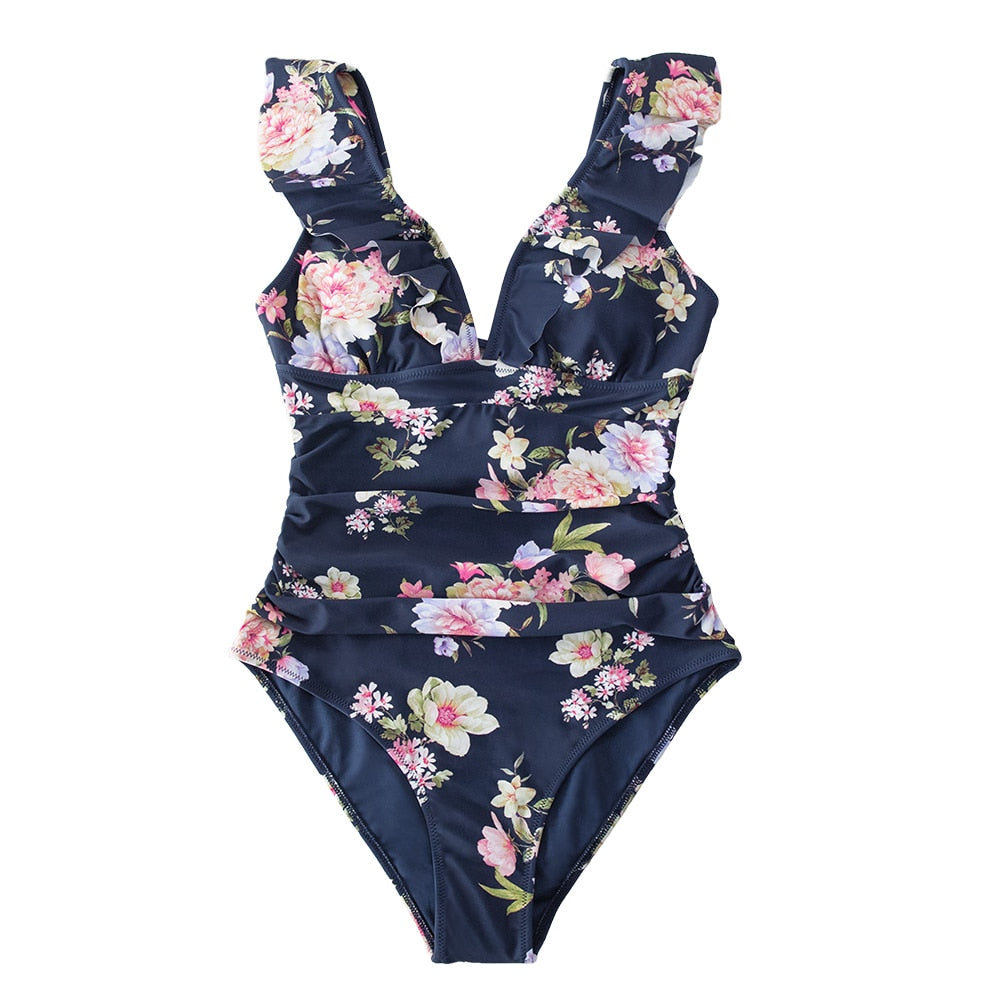 Solid black ruffled one-piece swimsuit with lace-up front from The Clothing Company Sydney, perfect for beach and swimwear.