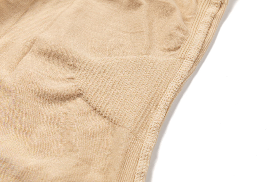 Seamless strapless women shapewear slip from The Clothing Company Sydney, designed for tummy control and full-body shaping under dresses.
