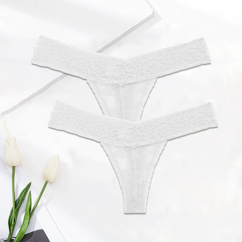Two lace G-string thong panties with floral design, transparent lingerie briefs from The Clothing Company Sydney, close-up view.