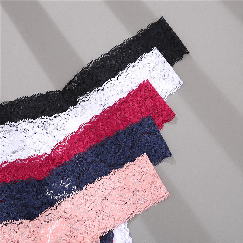 Two floral lace G-string thong panties from The Clothing Company Sydney, featuring transparent underwear design and delicate lingerie details.