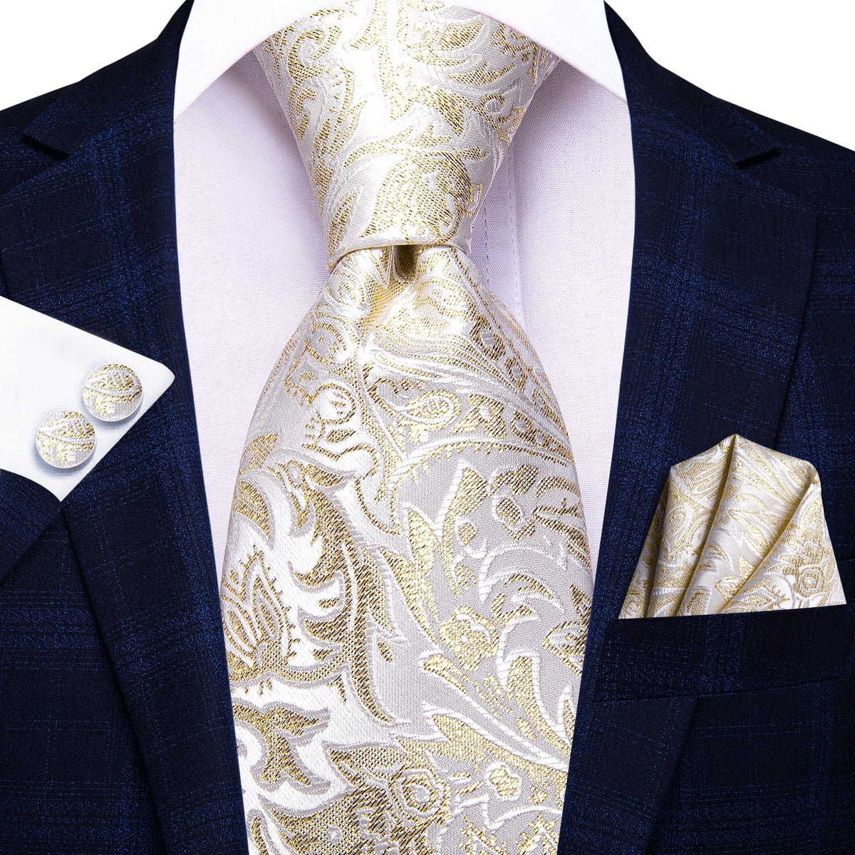 Three silk men's accessories set including paisley tie, pocket square, and cufflinks for formal or wedding attire.