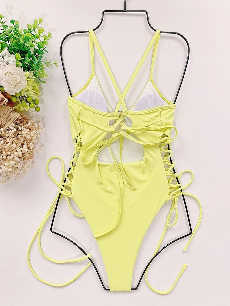 Backless bandage one-piece swimsuit by The Clothing Company Sydney with cut-out design, bodycon fit, perfect for beachwear.