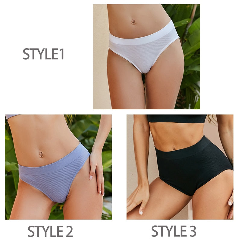 Two seamless women's thong panties from The Clothing Company Sydney, made of comfortable cotton blend, shown on a model.