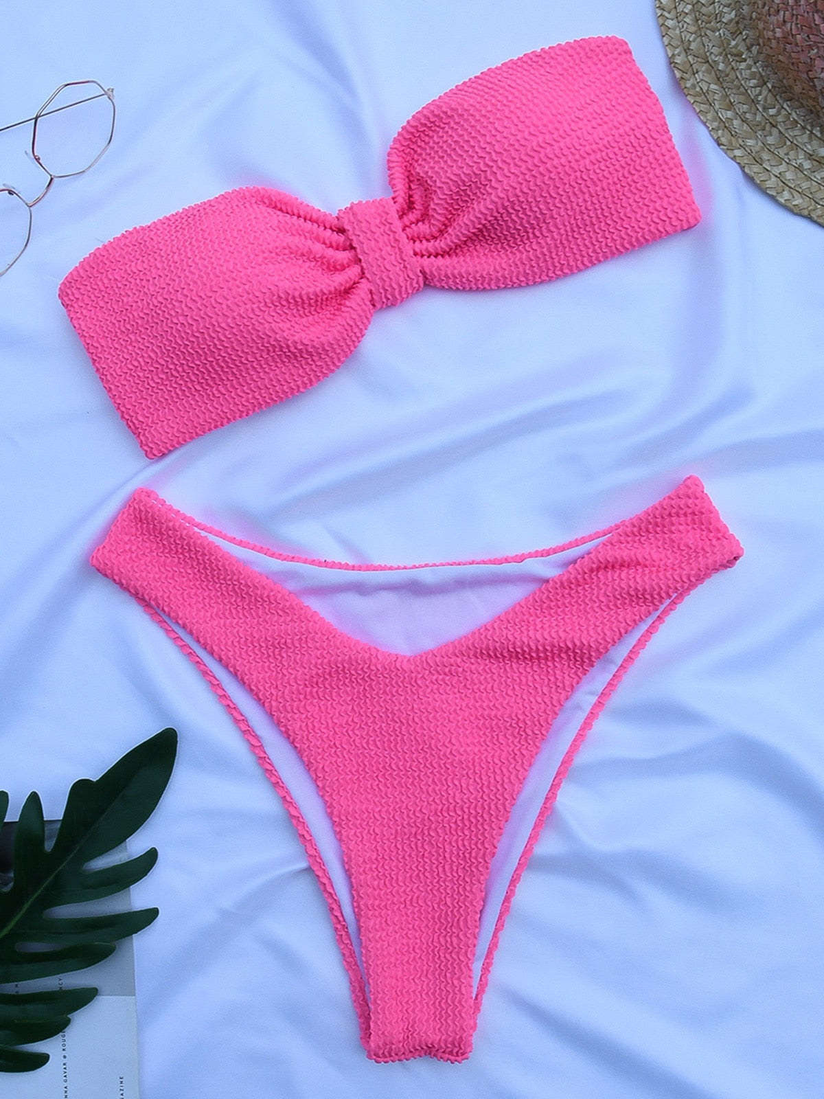 High waist bikini swimsuit by The Clothing Company Sydney featuring a bandeau top and thong Brazilian cut, in vibrant swimwear fabric.