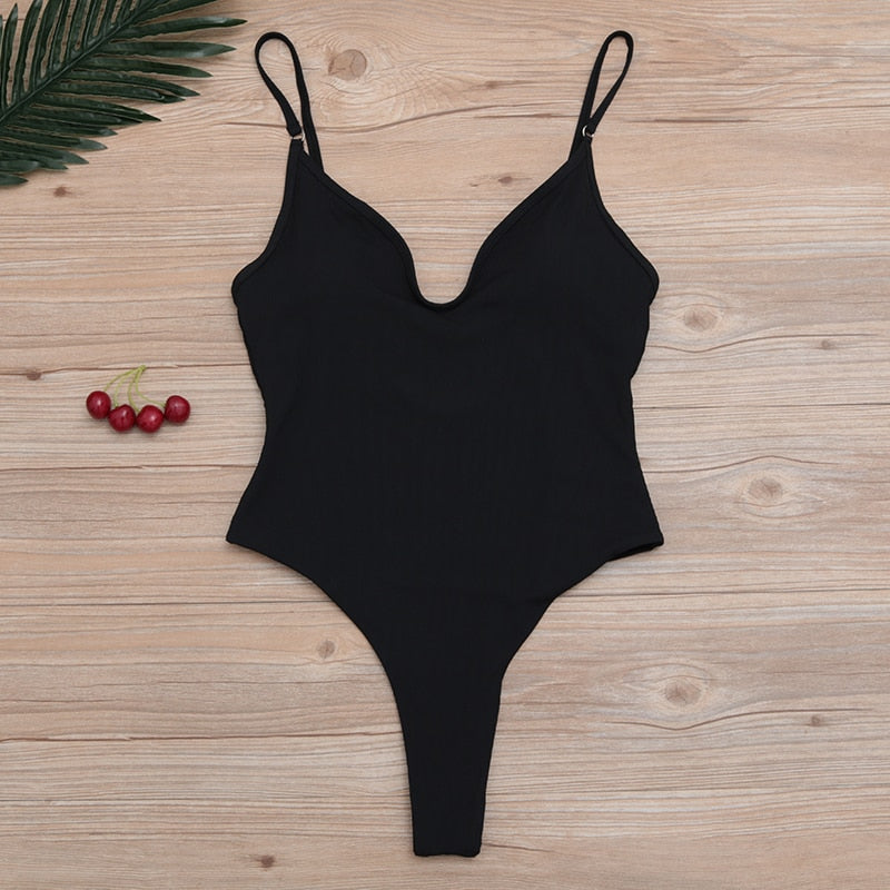 Solid one-piece swimsuit by The Clothing Company Sydney featuring high waist, push-up design, and stylish beach-ready bodysuit.