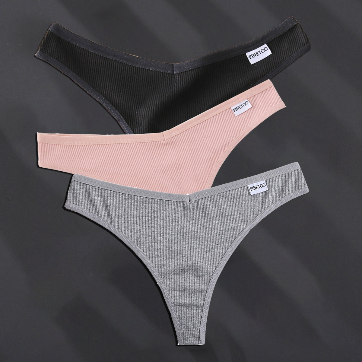 Three-pack cotton G-string panties by The Clothing Company Sydney, solid color lingerie underpants with thong design.