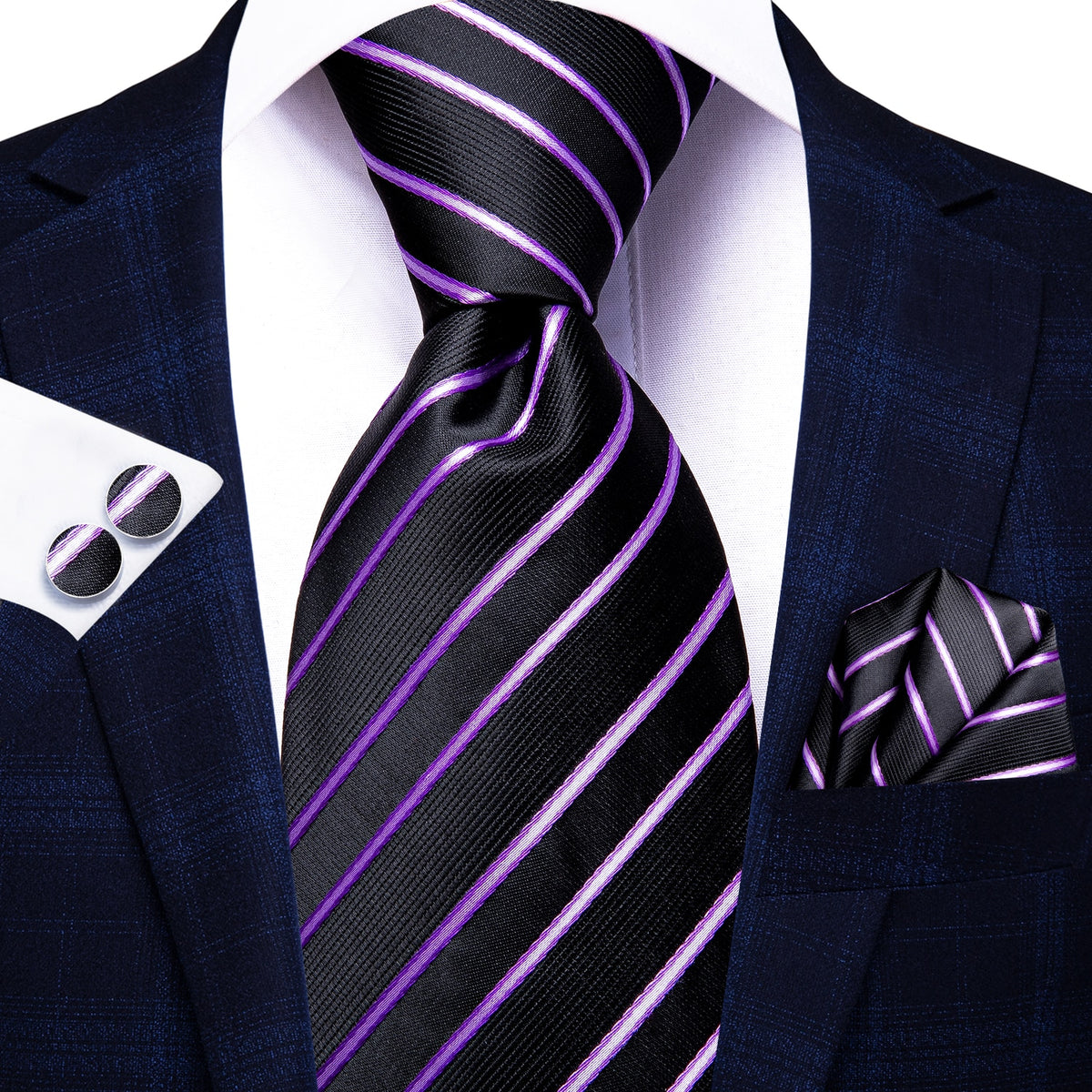Three 8.5cm solid paisley silk men's ties with matching accessories, including cufflinks and pocket square, for formal or wedding attire.