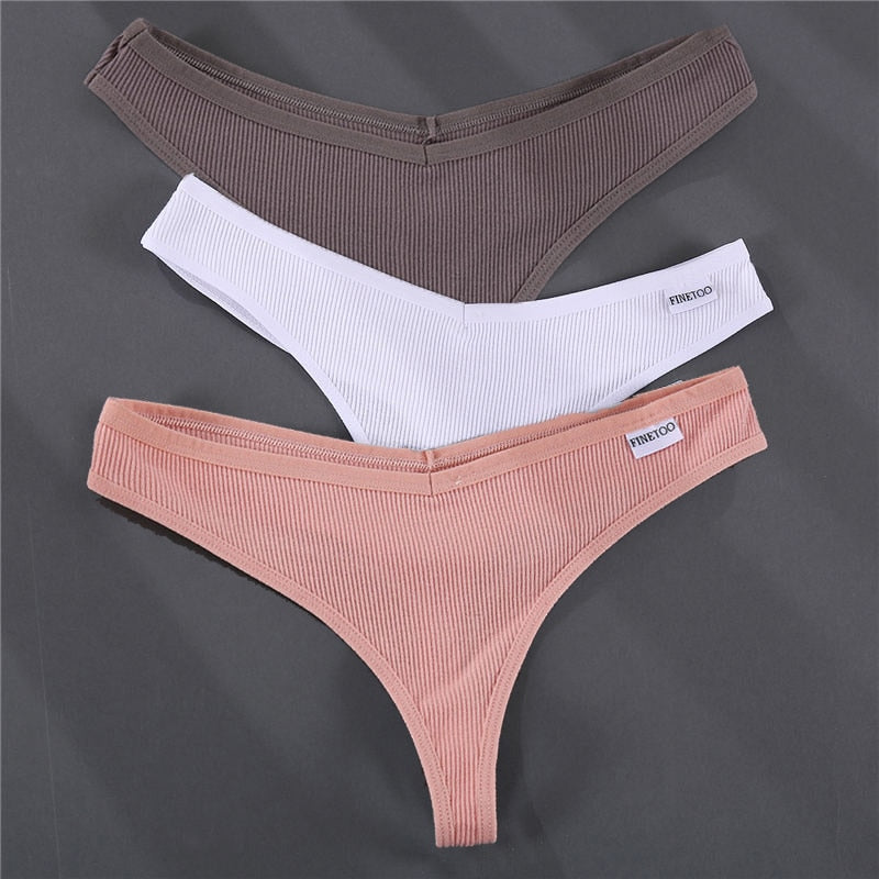 Three cotton G-string panties from The Clothing Company Sydney in solid colors, featuring comfortable thong design and lingerie style.