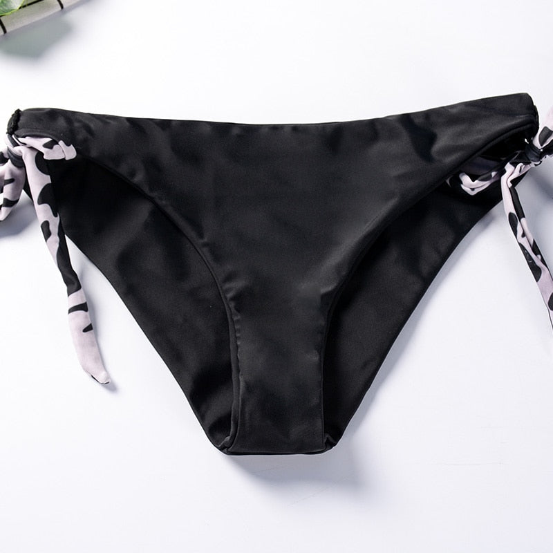 Two-piece leopard print bandeau bikini set with ruffles and push-up design, featuring swimwear style for women from The Clothing Company Sydney.