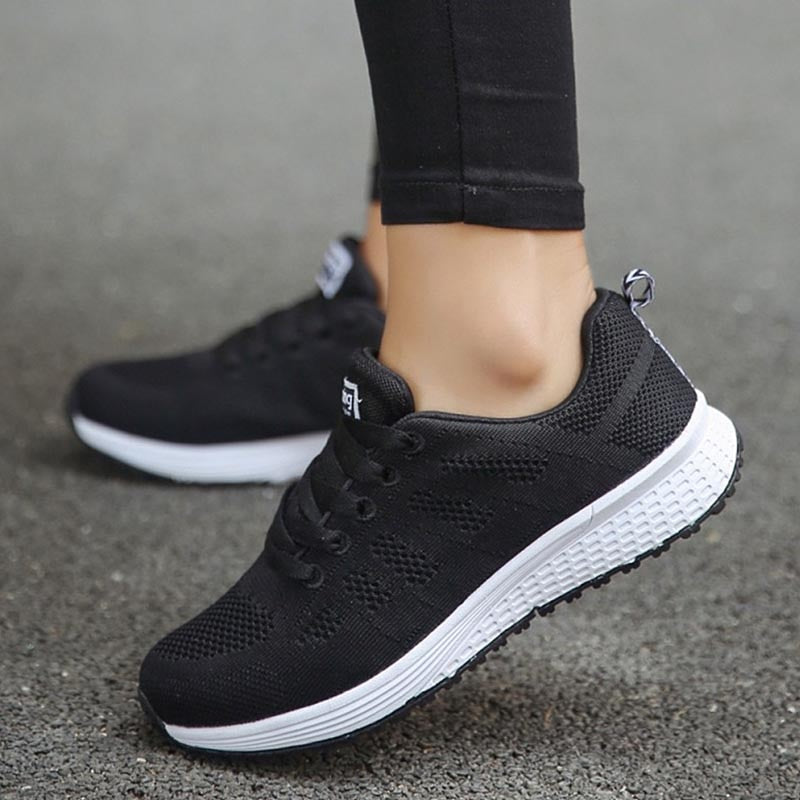 Women's lace-up sneakers by The Clothing Company Sydney featuring platform vulcanized design and breathable fabric for casual wear.