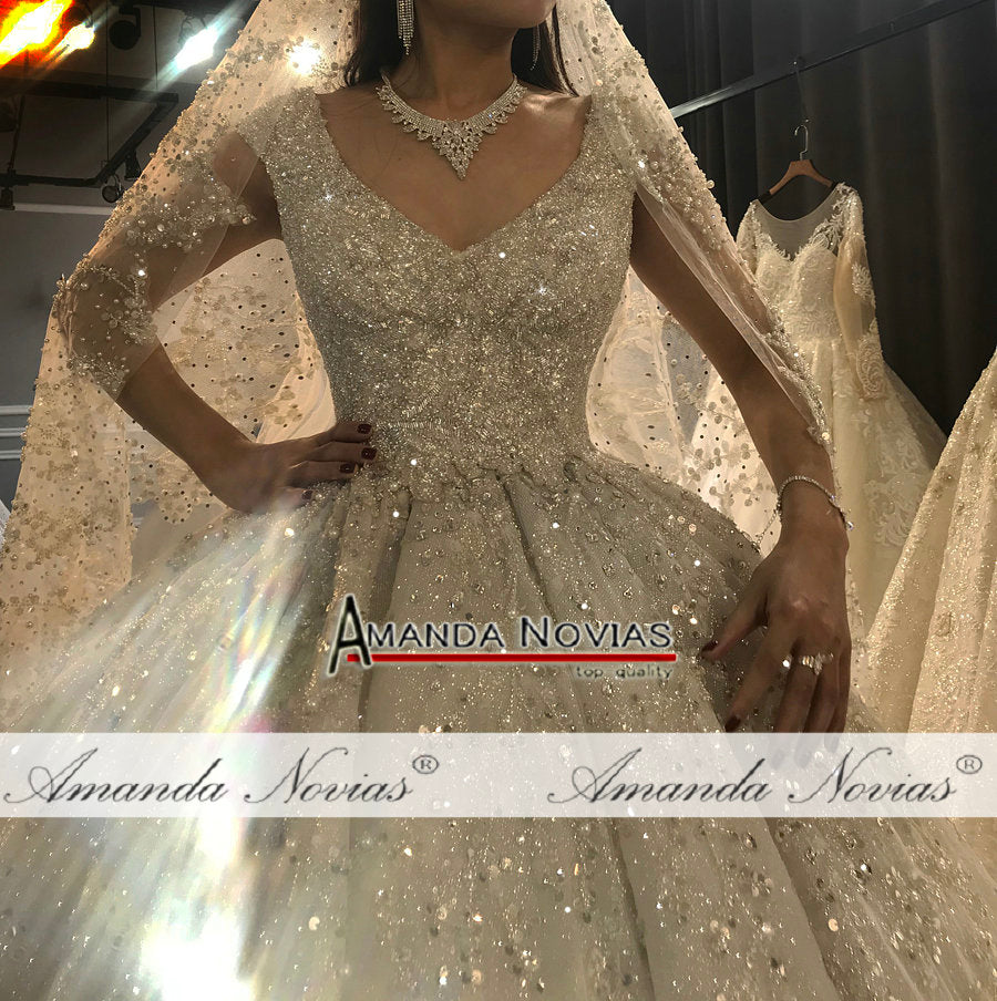 Luxurious wedding dress with heavy beading and intricate details from The Clothing Company Sydney, designed for bridal elegance.