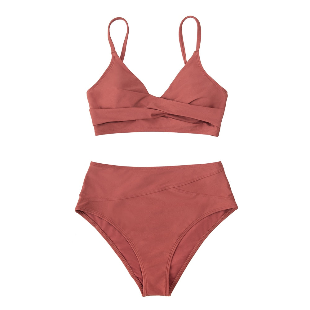 Red high-waist bikini set with twist detail and V-neck, stylish swimwear by The Clothing Company Sydney for beachwear and swimming.