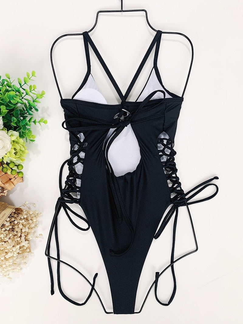 Backless one-piece bandage swimsuit by The Clothing Company Sydney featuring cut-out design and bodycon fit, ideal for beachwear.