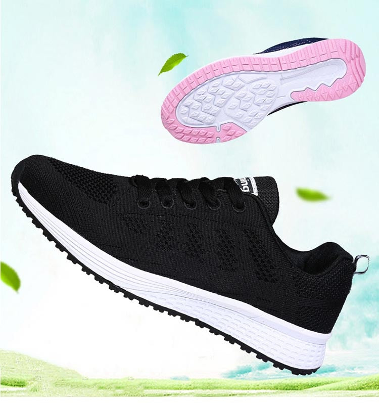 Lace-up women's sneakers from The Clothing Company Sydney featuring breathable fabric, platform sole, and vulcanized shoe design.
