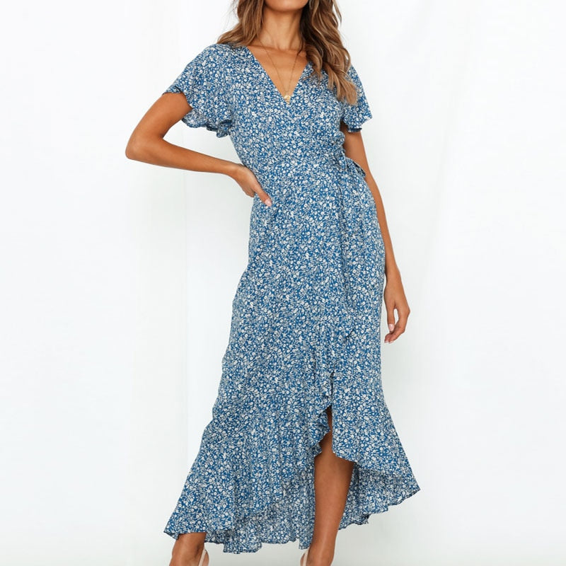 Long boho floral print maxi dress by The Clothing Company Sydney featuring V-neck, ruffles, high slit, and wrap design.