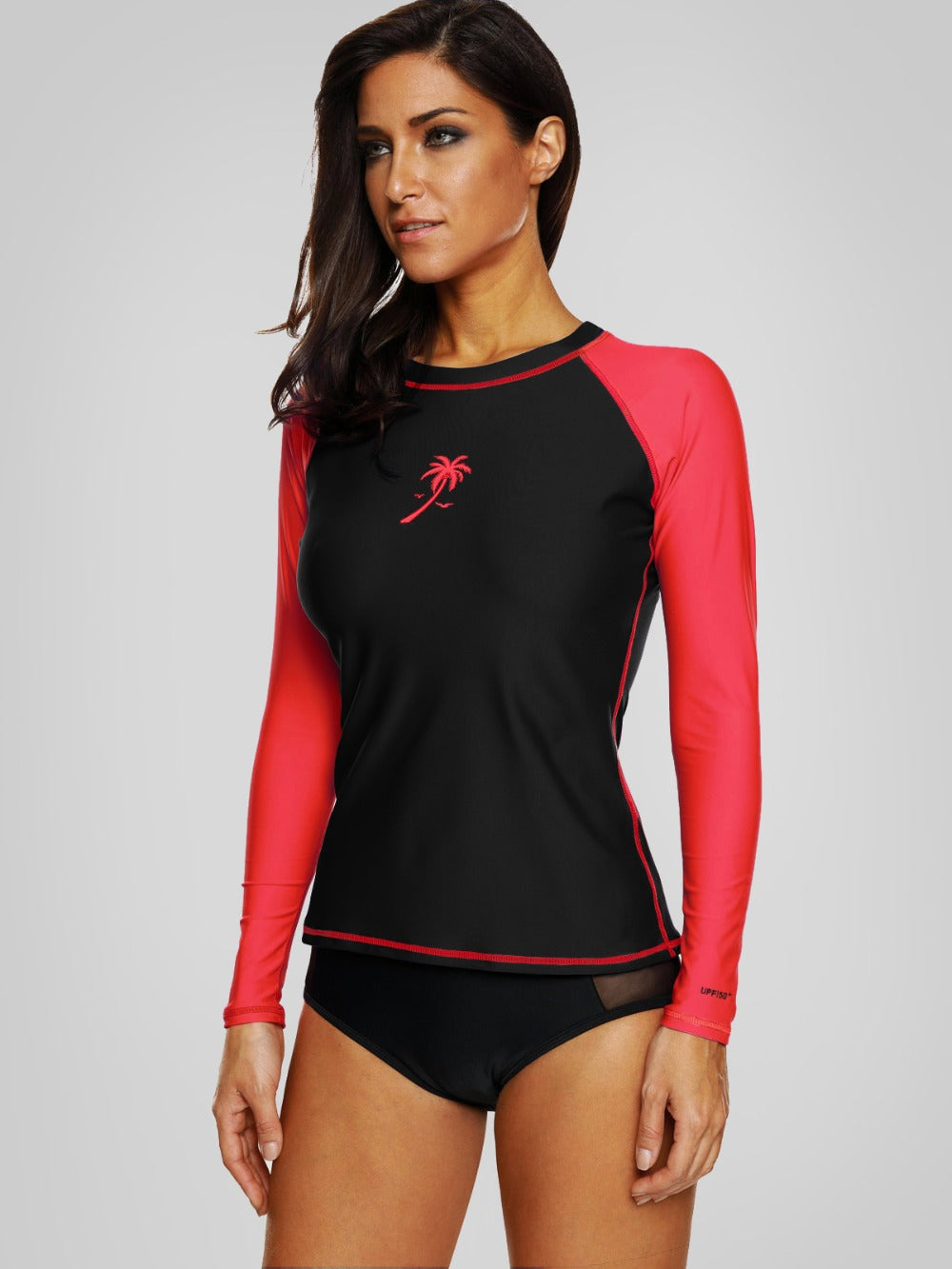 Women's long sleeve rashguard swimwear by The Clothing Company Sydney, colorblock design with UPF50+ for beach and surfing.