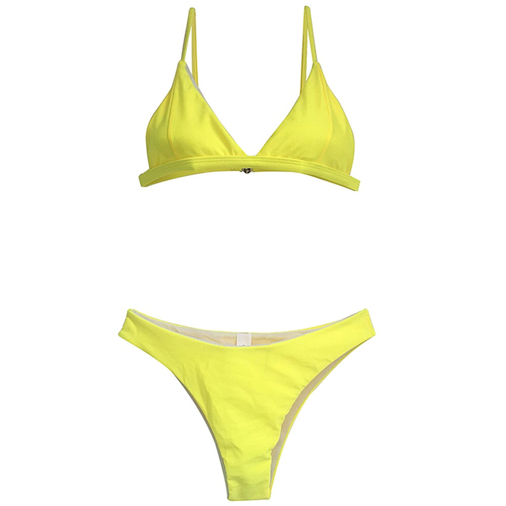 Bright orange, pink, and yellow halter swimsuit set by The Clothing Company Sydney, featuring a solid beach thong bikini for summer.