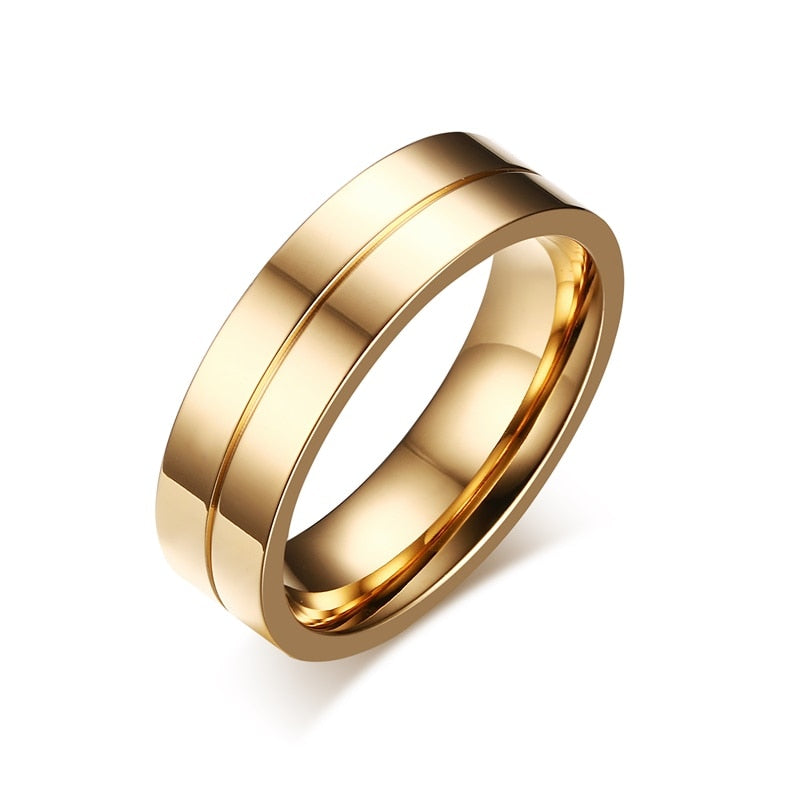 Gold-colored stainless steel wedding band bracelet with CZ stones, designed for couples, featuring a trendy, elegant jewelry style.