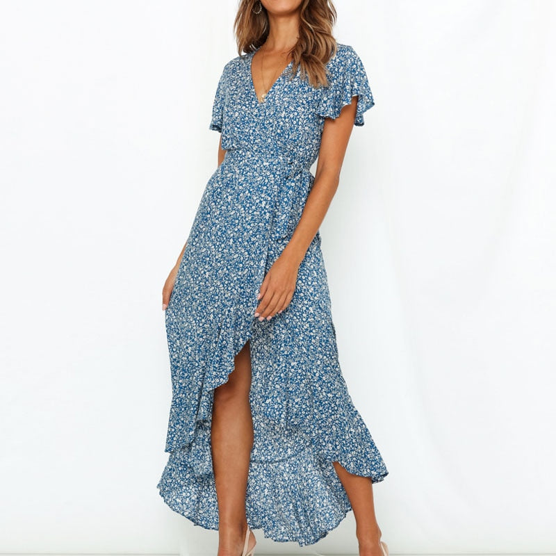 Long boho floral print maxi dress by The Clothing Company Sydney featuring V-neck, ruffles, high slit, and wrap design.