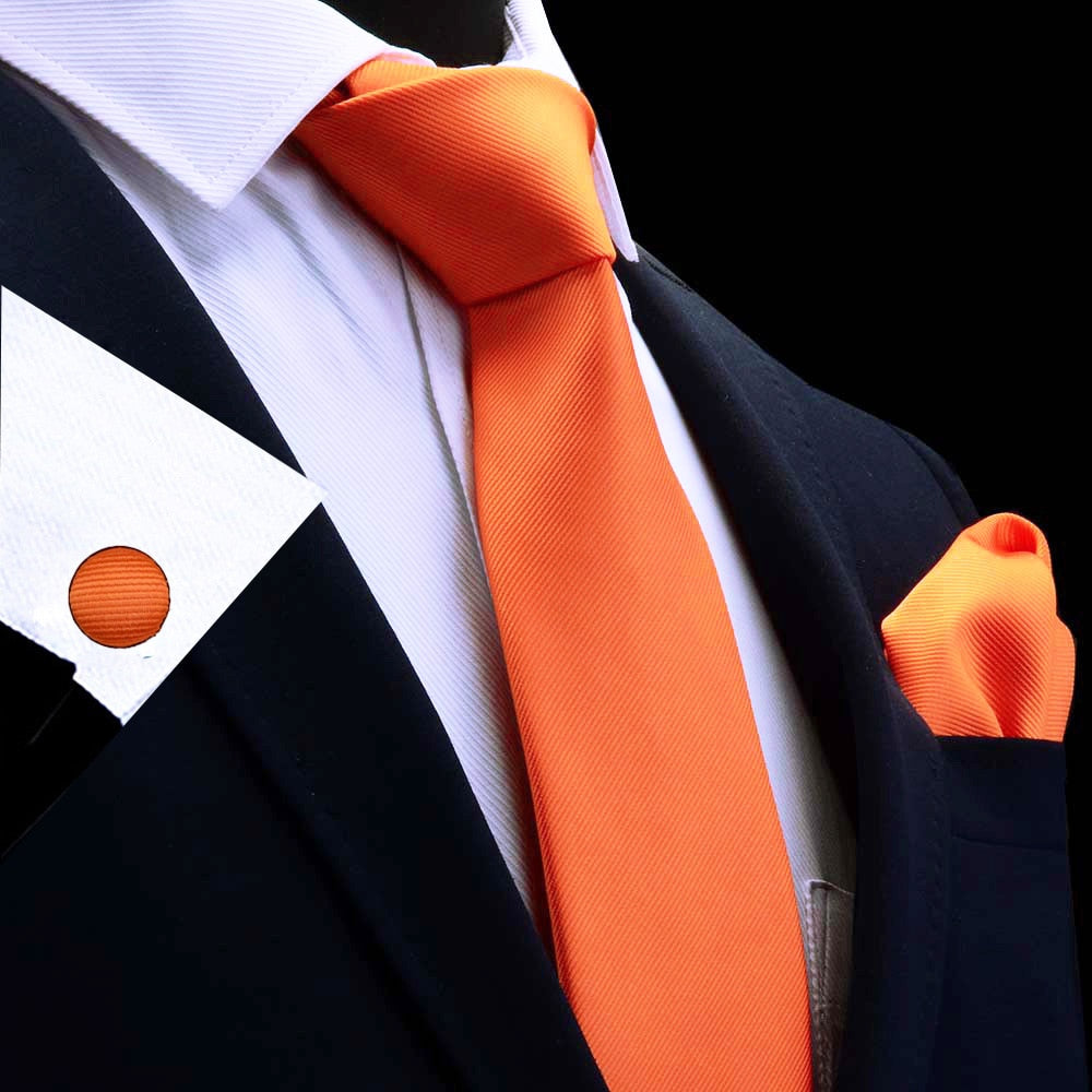 Three men's silk tie set with red, gold, and purple neckties, matching handkerchiefs, and cufflinks, for wedding or formal wear.