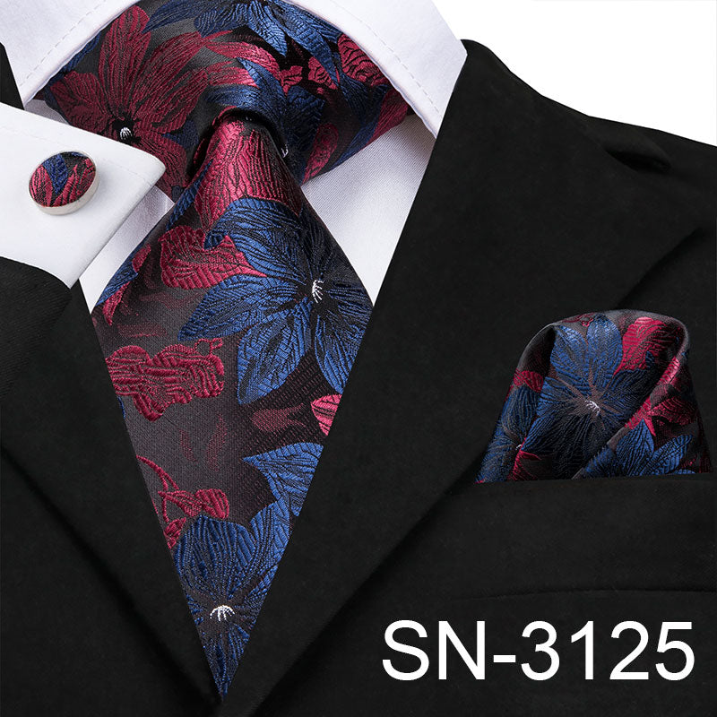 Light blue silk men's tie set with plaid design, includes matching hanky and cufflinks, perfect for business or wedding attire.