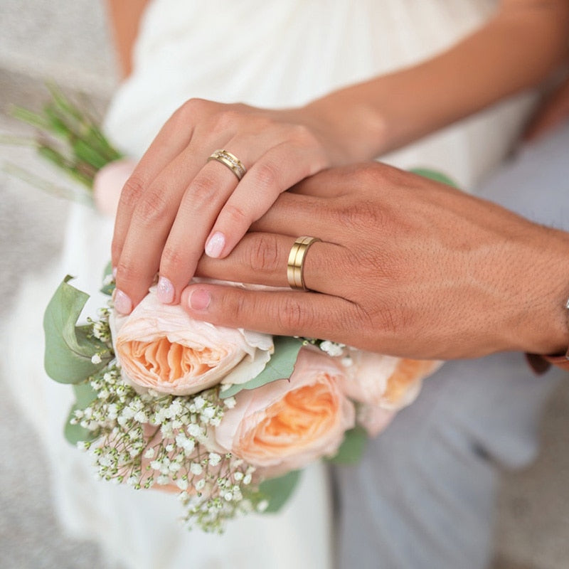 Gold-colored stainless steel wedding band bracelet for women and men with CZ stones, a stylish love gift from The Clothing Company Sydney