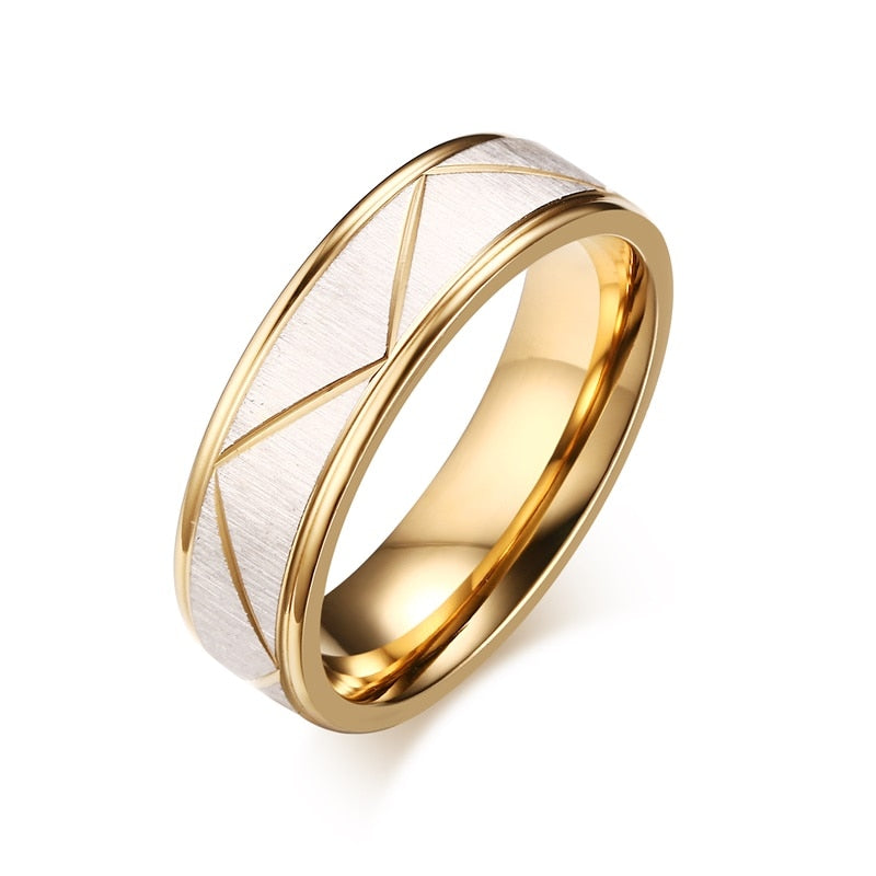 Matte finish stainless steel wedding rings for couples, gold color, personalized engraving, displayed as bracelets, by The Clothing Company Sydney.
