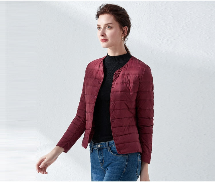 Lightweight women's down coat from The Clothing Company Sydney, with ultra light duck down and windbreaker design.