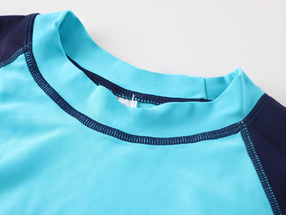 Women's long sleeve rashguard swimsuit top by The Clothing Company Sydney, colorblock design, UPF50+ beachwear for surfing and swimming