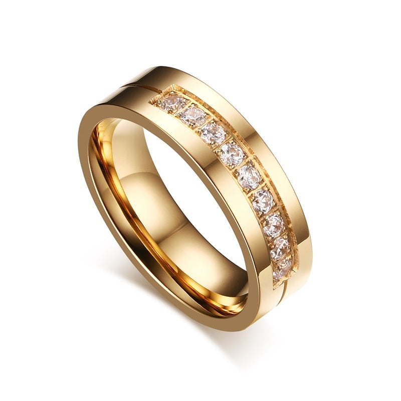 Gold-colored stainless steel wedding band bracelet for couples, featuring CZ stones, symbolizing love and commitment.