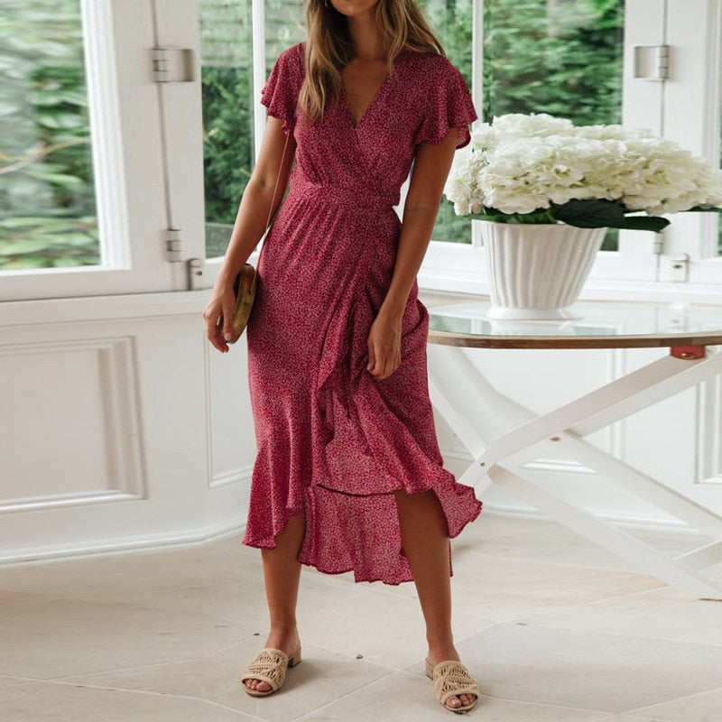 Long boho floral print summer maxi dress by The Clothing Company Sydney featuring a V-neck, ruffles, and high slit detail.