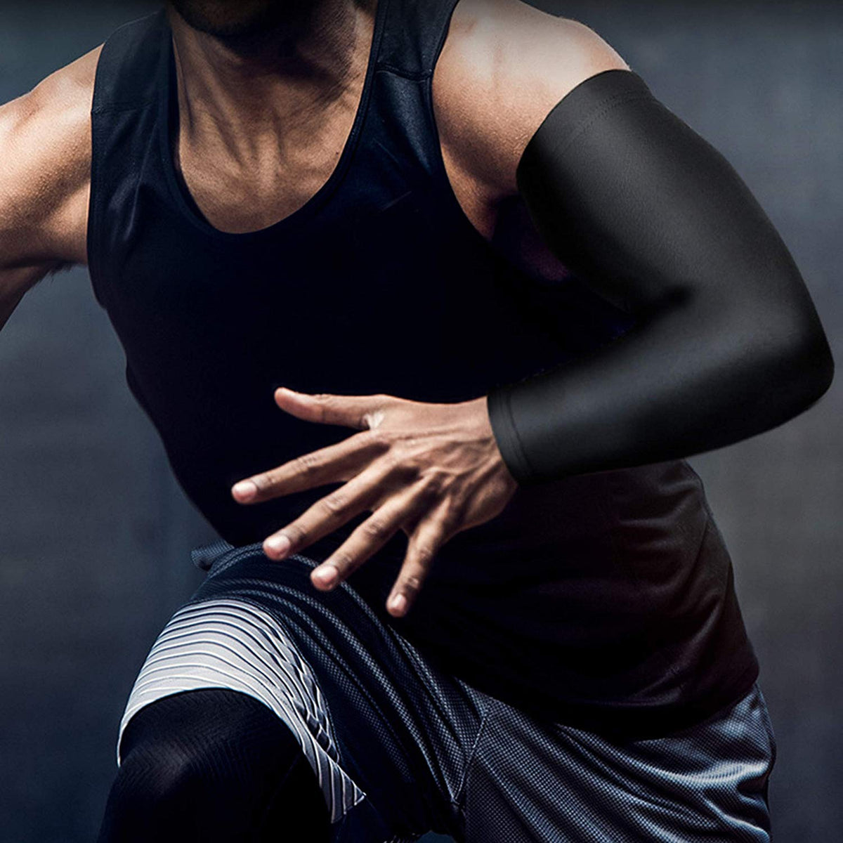 Sports arm compression sleeve by The Clothing Company Sydney, ideal for basketball, cycling, golf, running, and UV protection.