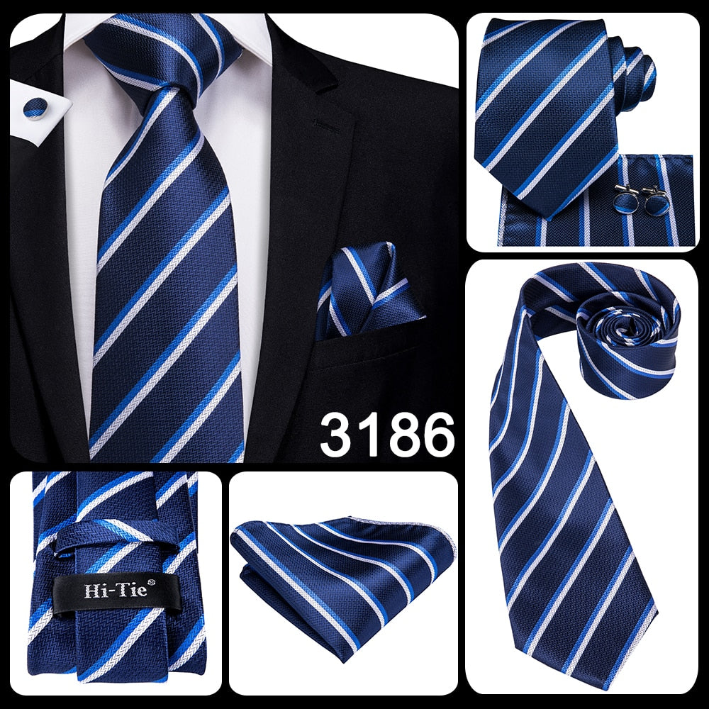 Three-piece men's accessories set including a blue and black striped silk necktie, pocket square, and cufflinks for formal occasions.