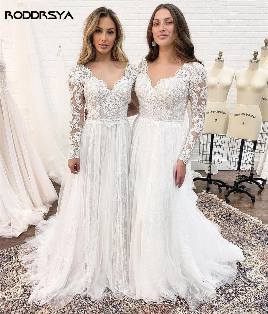 Ivory A-line long sleeve wedding dress with lace details, tulle fabric, and open back design by The Clothing Company Sydney.