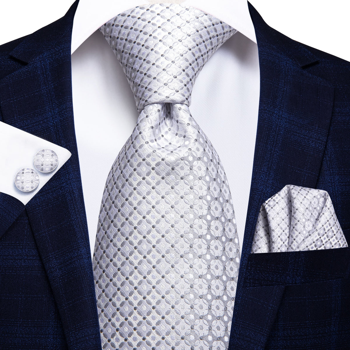 Three men's silk neckties featuring solid paisley patterns in black, blue, and red for formal occasions and weddings.