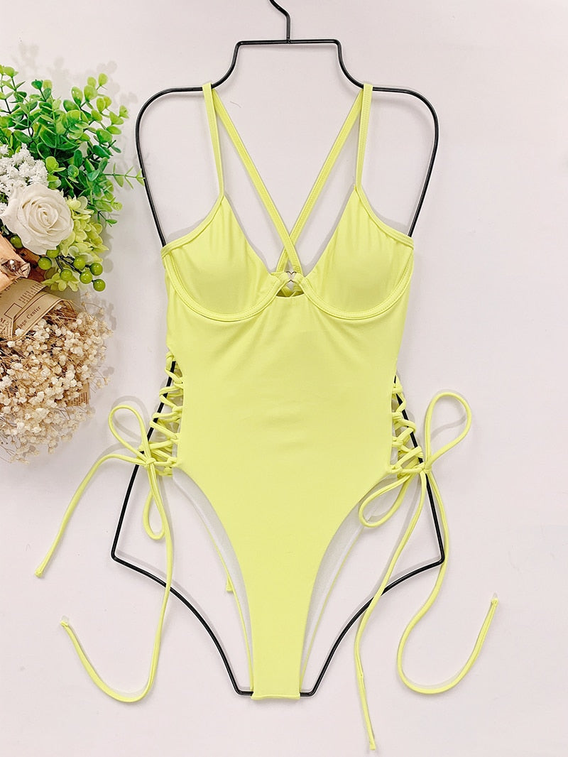Backless bandage one-piece swimsuit by The Clothing Company Sydney, featuring cut-out design and bodycon fit for beachwear.