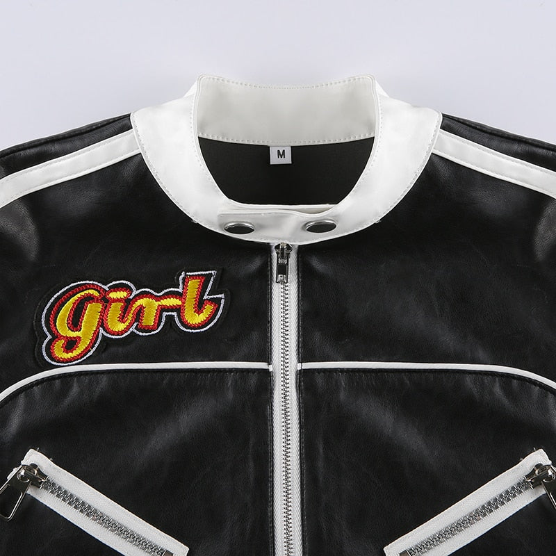 Women’s punk style patchwork cropped PU leather jacket with zippers, contrast colors, suitable for autumn and winter.