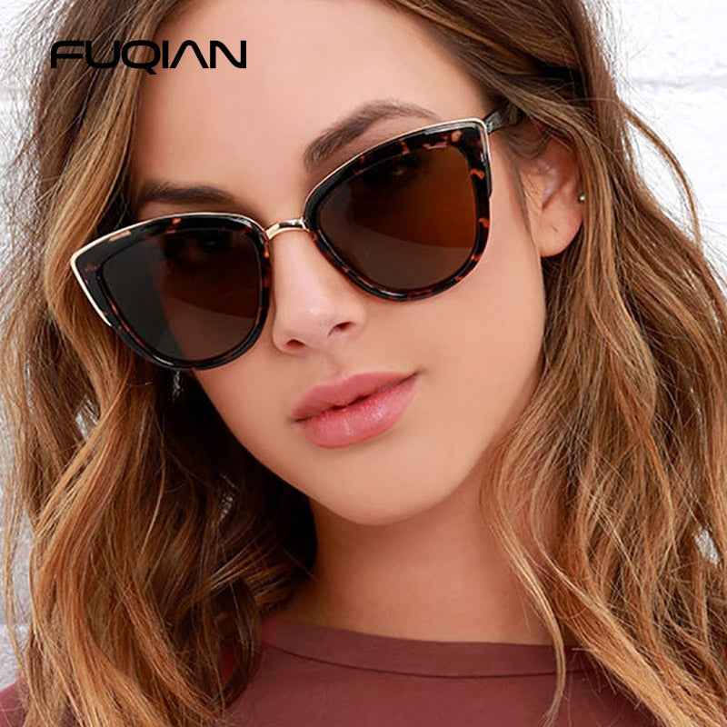 Vintage Cateye women’s sunglasses by The Clothing Company Sydney with leopard print frames and UV400 anti-glare lenses.