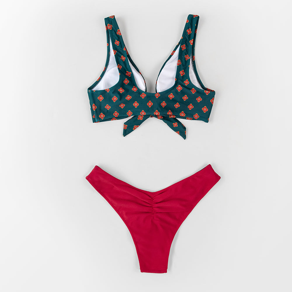 Reversible floral V-neck thong bikini set by The Clothing Company Sydney, featuring two-piece swimwear with colorful floral pattern.