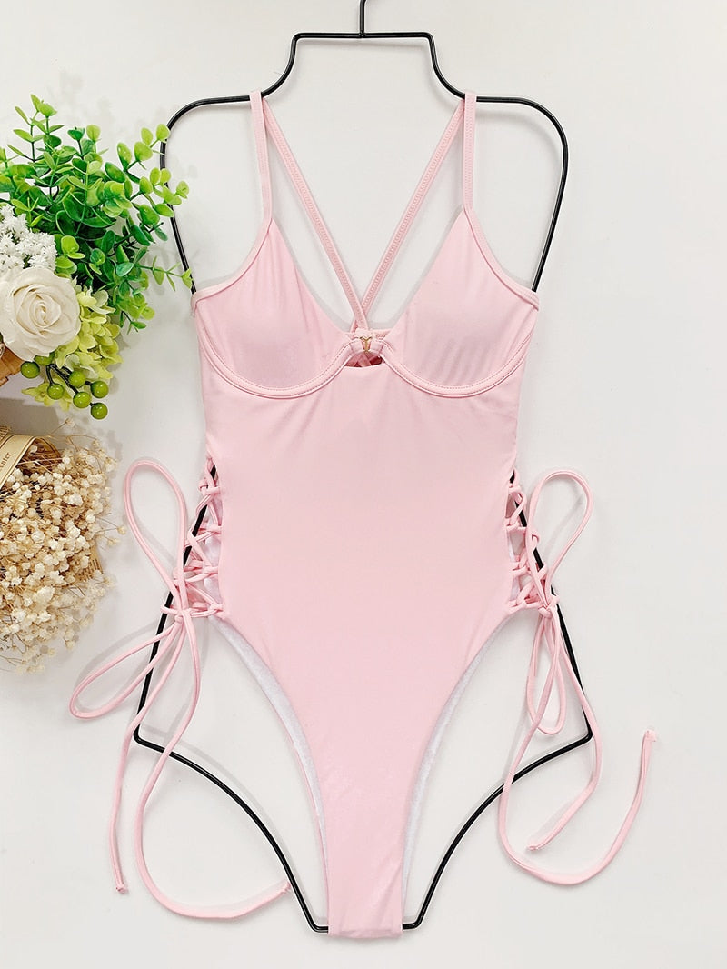 Backless bandage one-piece swimsuit by The Clothing Company Sydney featuring cut-out design and bodycon fit, perfect for beachwear.