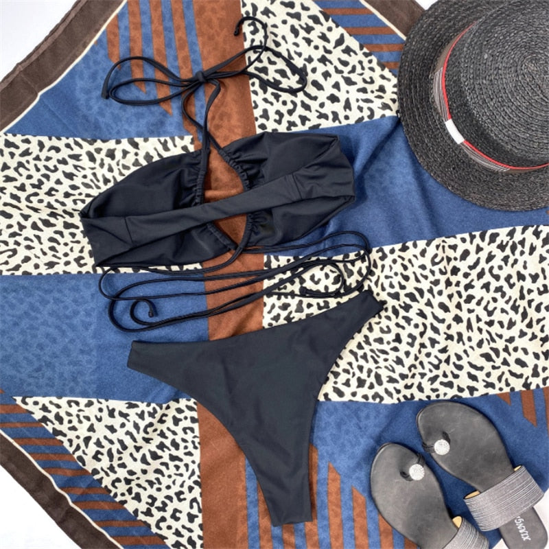 Drawstring bandage bikini set by The Clothing Company Sydney, solid halter swimsuit with adjustable straps, two-piece beachwear.