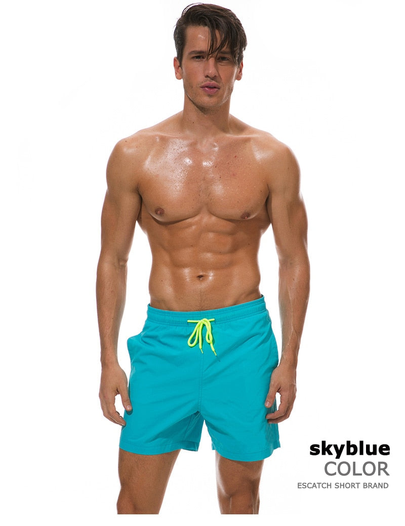 Men's swim shorts by The Clothing Company Sydney, featuring a vibrant beach board short design for swimming and beach activities.