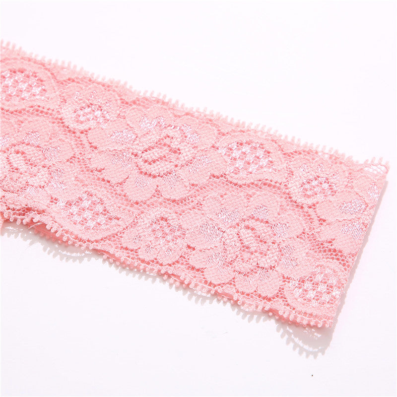 Two lace G-string thong panties from The Clothing Company Sydney featuring floral design and transparent lace lingerie briefs.