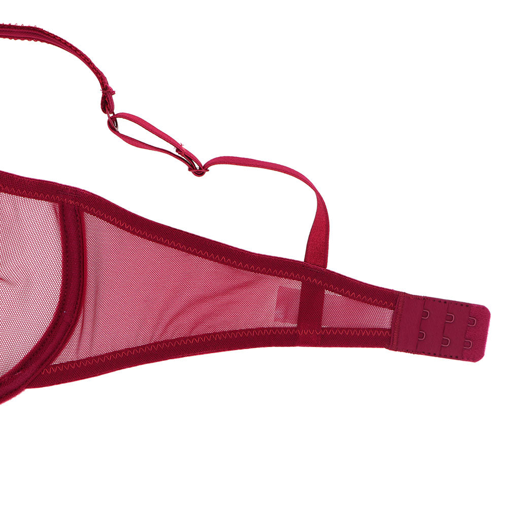 Ultra-thin transparent yarn lingerie set with bras, garters, thongs, and stockings from The Clothing Company Sydney.