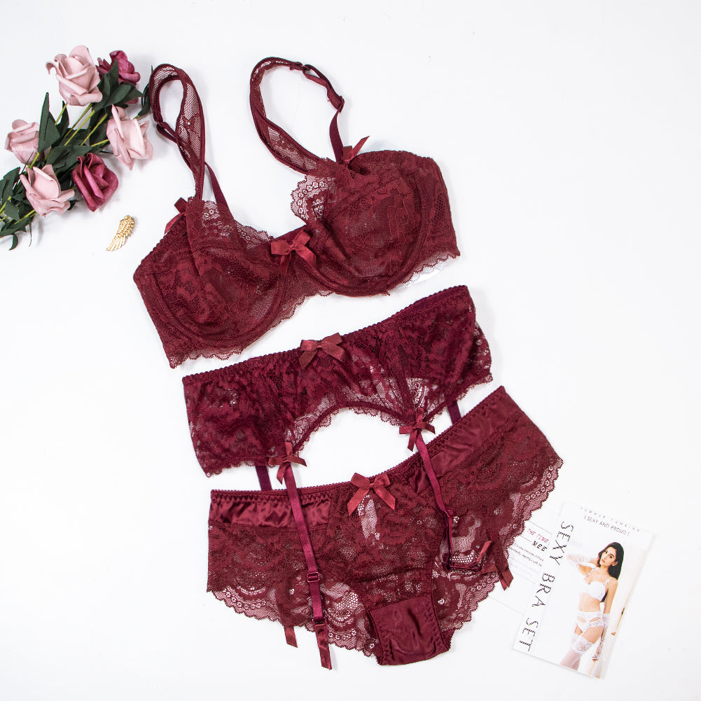 Plus size floral lace lingerie set with bowknot details, including bra, panties, and garter from The Clothing Company Sydney.