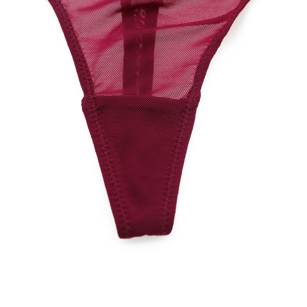 Ultra-thin transparent yarn lingerie set by The Clothing Company Sydney, includes bras, garters, thongs, and stockings.
