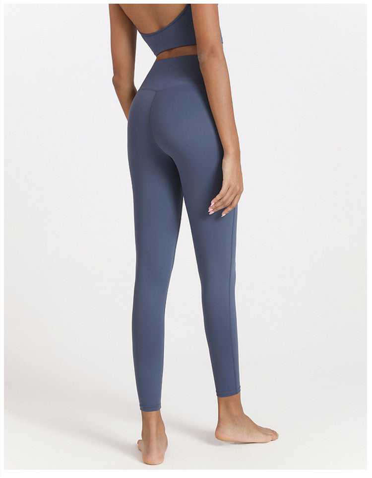 High waist yoga pants with large hidden pocket, soft elastic fabric, quick-dry material, designed for women’s fitness and Pilates.