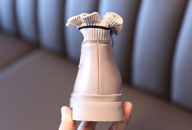 Kids' flower girl boots by The Clothing Company Sydney, plush leather warm winter shoes for boys and girls with soft lining.