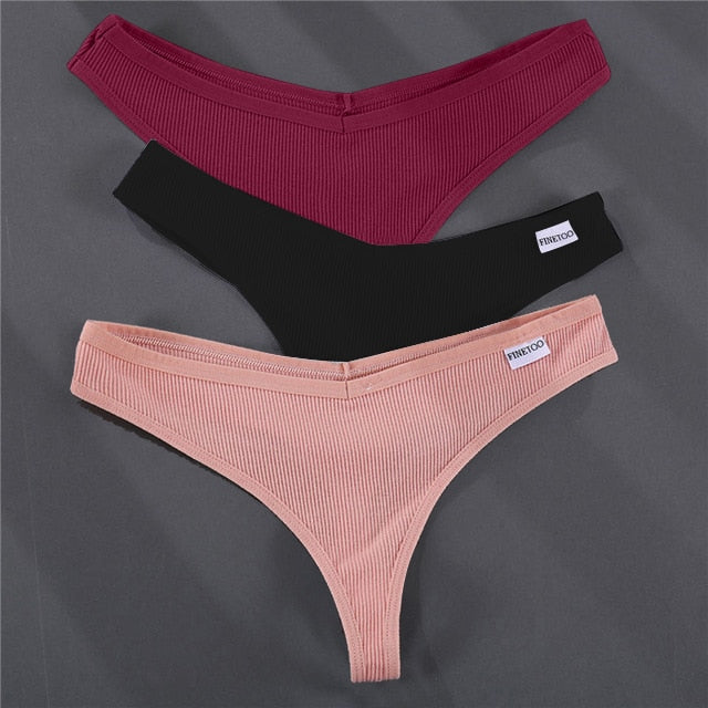 Three pairs of solid color cotton G-string panties from The Clothing Company Sydney, showcasing comfortable lingerie underpants.